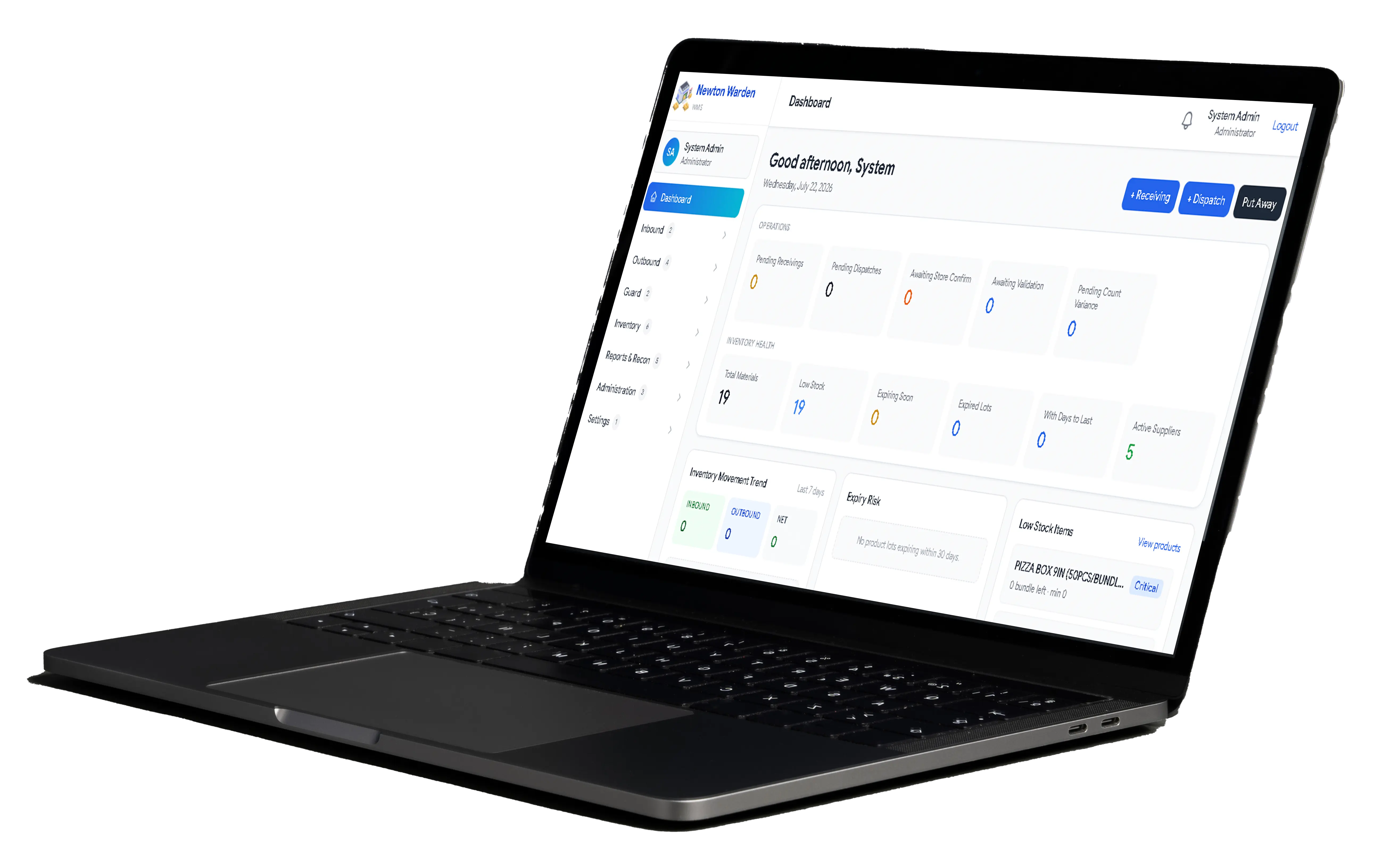 Warehouse Management System dashboard on a laptop